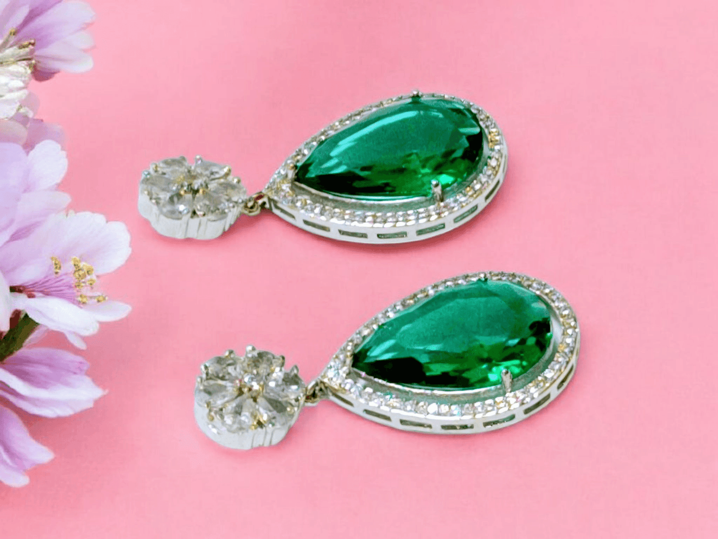 Rohdium plated emerald green and white drop earrings