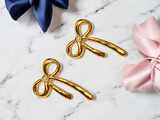 Dangling bow gold anti tarnish earrings